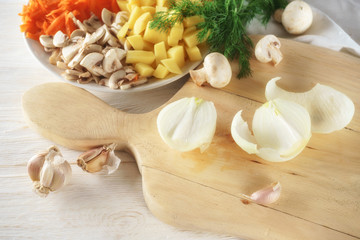 chopped onion and ingredients for soup