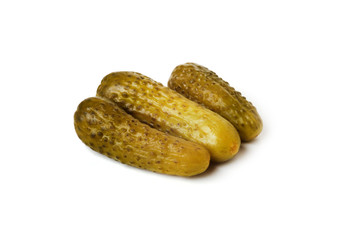 Pickled cucumbers on a white background