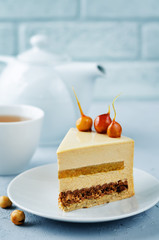 Caramelized white chocolate dried apricots hazelnut mousse cake
