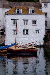 Fototapeta na wymiar House and Boat in Polperro, Cornwall