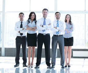 Group portrait of a professional business team looking confident
