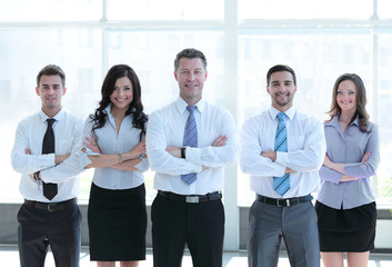 Group portrait of a professional business team looking confident