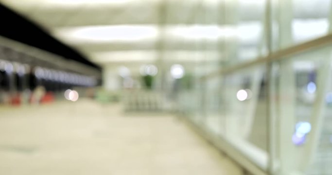 Woman walking to the taxi stop in airport