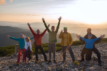 Happy friends during a travel in mountains
