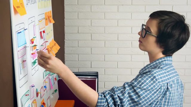 Young UX designer developing Mobile app responsive layout