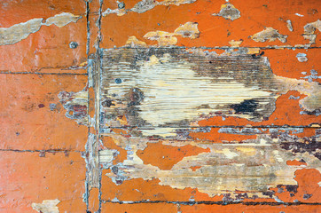 Texture of old dilapidated wooden floor with brown peeling paint. Exfoliated Paint on an Old Wooden Floor. Shabby Background
