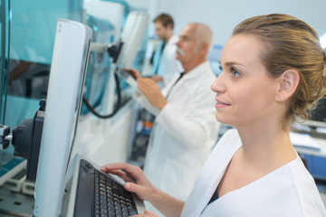 portrait of a female researcher doing research in a lab