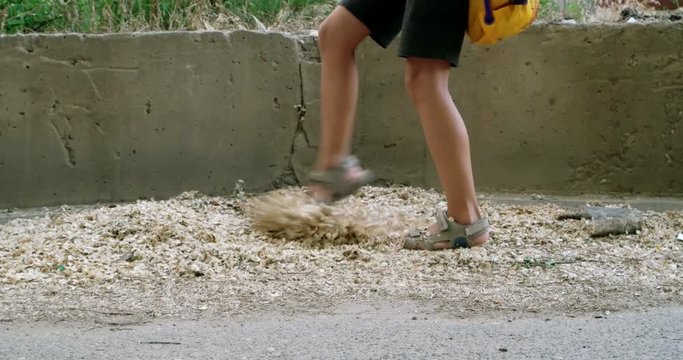 Small boy play with ekm seeds