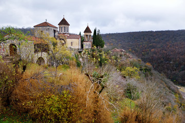 Fototapeta na wymiar Motsameta Monastery located on breathtaking cliff-top promontory above a bend of the Tskhaltsitela River