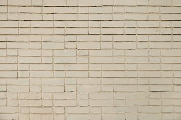 Obraz premium Old beige brick wall background texture