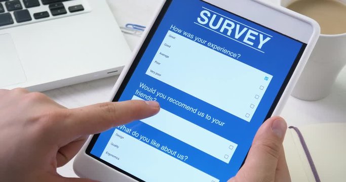 Taking online survey using smartphone digital tablet