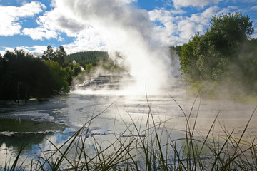 Geothermal steam rises from terraces in plumes near Taupo, on New Zealand's North Island