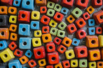 small block of colorful ceramic laying for background