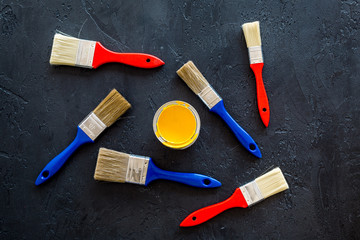 house renovation with implements set for building, painting and repair black table background top view pattern