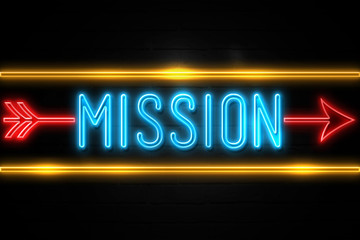 Obraz premium Mission - fluorescent Neon Sign on brickwall Front view