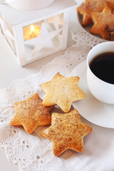 Homemade Christmas cookies, coffee and white lantern