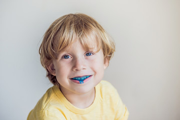 Three-year old boy shows myofunctional trainer to illuminate mouth breathing habit. Helps equalize...