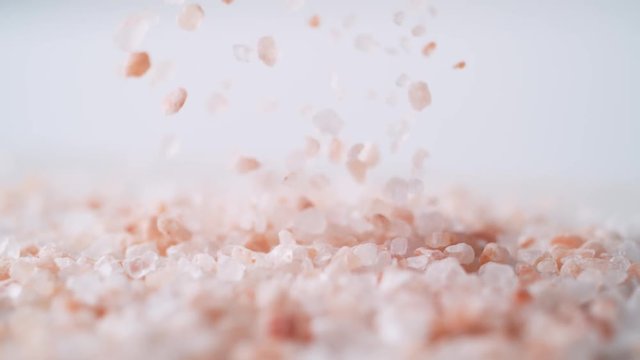Himalayan rock salt falling. Shot with high speed camera, phantom flex 4K. Slow Motion.