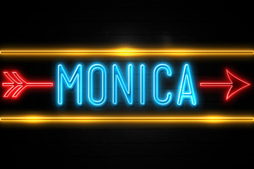 Monica  - fluorescent Neon Sign on brickwall Front view