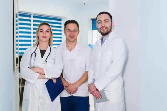 Portrait Of Medical Team Standing In Hospital Hall