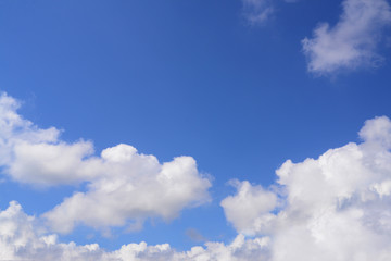Naklejka na ściany i meble Nice blue cloudy sky in sunny day