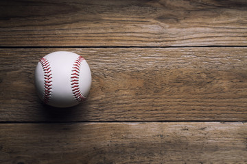 baseball on wood table background