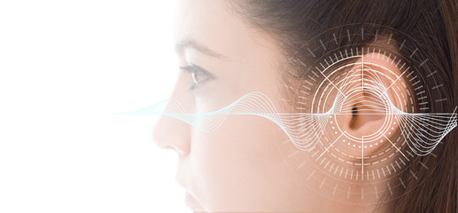 Hearing test showing ear of young woman with sound waves simulation technology - obrazy, fototapety, plakaty
