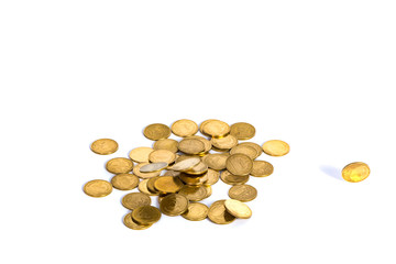 Falling gold coins. Money on a white background. shallow focus.
