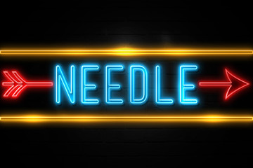 Obraz premium Needle - fluorescent Neon Sign on brickwall Front view