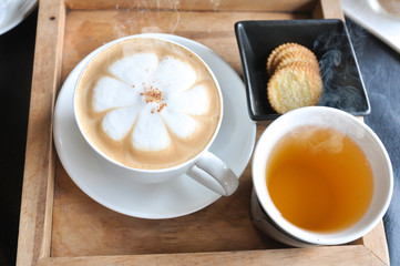 Coffee cup in coffee shop,Cup of coffee on a wooden table,cup of coffee on table in cafe,cup of cappuccino