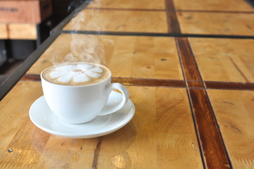 Coffee cup in coffee shop,Cup of coffee on a wooden table,cup of coffee on table in cafe,cup of cappuccino