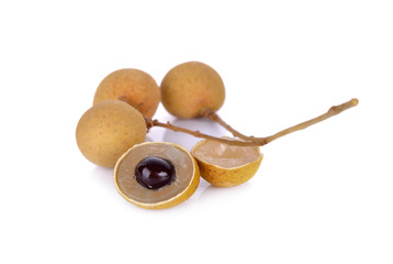 ripe longan fruit with stem on white background