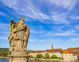 Fototapeta na wymiar Statues on the Alte Mainbruecke in Wuerzburg, Franconia, Bavaria, Germany