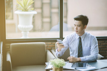 Fototapeta premium Administrator business man financial inspector and secretary making report, Internal Revenue Service checking document. Hand man doing finances and calculate on desk about cost at home office. Balance