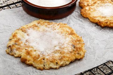 warm potato pancake with sugar on kitchen paper