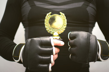 Boxing king, fighter champion, best of the best concept. Fighting competition winner man holds in...