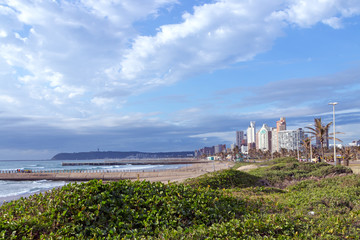 Coastal Landscape Dune Vegetation Beach Sea Against  City Skyline