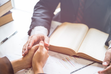 Client and lawyer have a sit down face to face meeting to discuss the legal options available