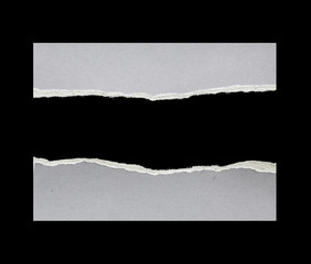 torn paper isolated on black background with copy space for text