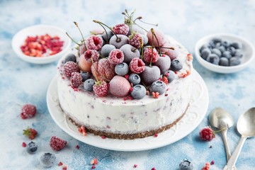 vanilla ice cream cake with frozen berries © anna_shepulova
