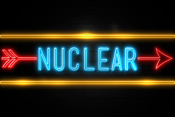 Nuclear  - fluorescent Neon Sign on brickwall Front view