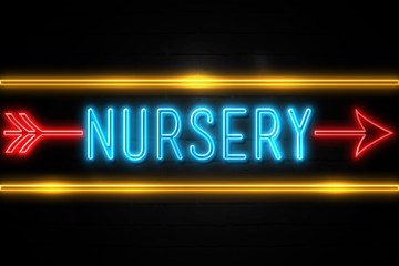 Obraz premium Nursery - fluorescent Neon Sign on brickwall Front view