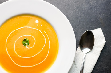 Colorful butternut squash soup. Squash soup is traditionally eaten during the fall season. Pumpkin...