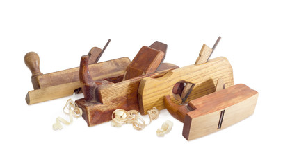 Several old wooden hand planes different purposes