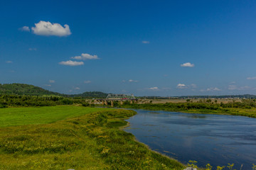 The natural landscape and clouds. Near the river.