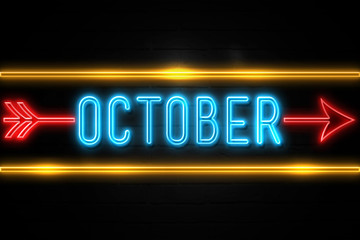 October  - fluorescent Neon Sign on brickwall Front view