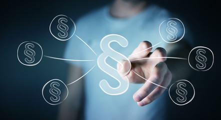 Businessman touching law protection right symbol