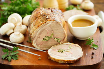 Rack of lamb stuffed with champignons and parsley.