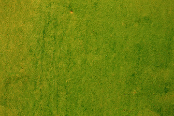 Texture of vintage rusty green iron wall background with many layers of paint