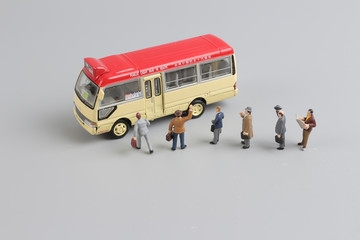 Mini travellers at a busy bus station